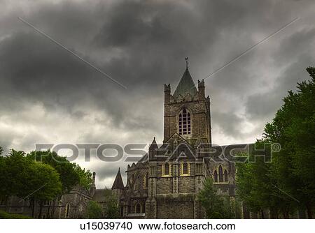 Stock Image - Stormy sky over Christ Church Cathedral. Fotosearch