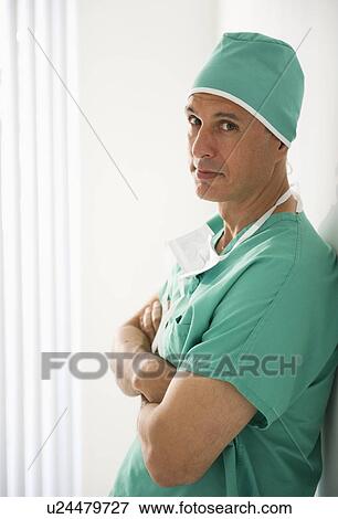 Stock Photo - Surgeon wearing medical scrubs. Fotosearch