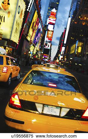 Stock Photography - Taxi in Times Square. Fotosearch