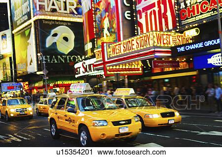 Stock Image - Times Square New York City at dusk. Fotosearch