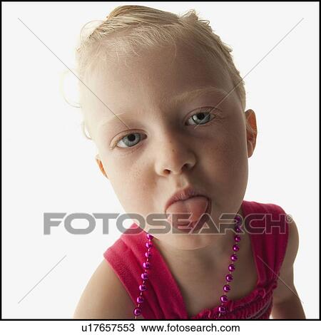 Stock Image - Toddler sticking her tongue out. Fotosearch