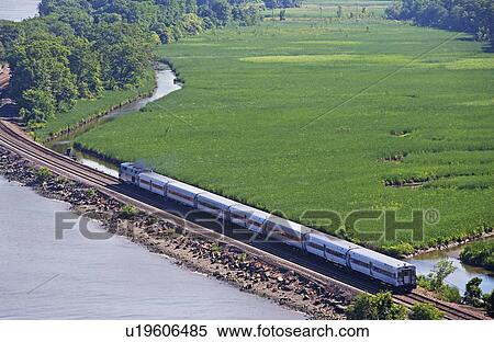 Stock Photography - Train beside Hudson River. Fotosearch
