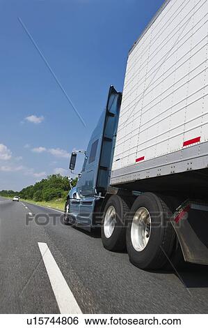 Stock Photograph - Transport truck on highway. Fotosearch