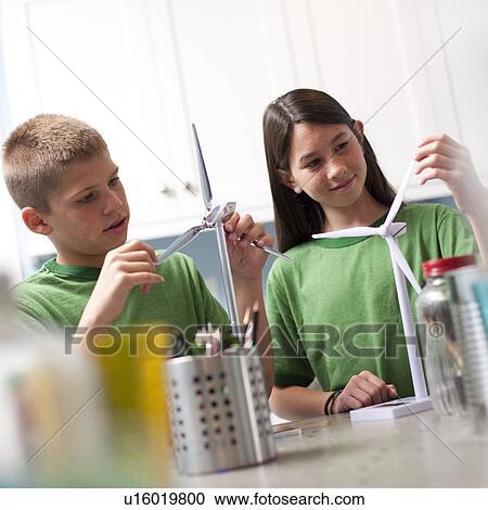 Two children making model windmills View Large Photo Image Stock Image - Two children making model windmills. Fotosearch