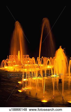 Stock Photo - Water fountains at night. Fotosearch