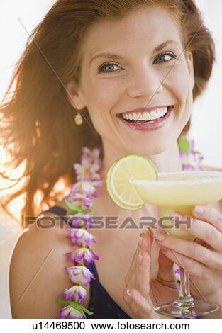 Woman drinking a frozen cocktail View Large Photo Image Stock Image - Woman drinking a frozen cocktail. Fotosearch