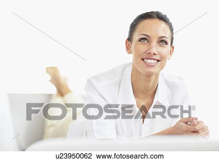 Woman relaxing View Large Photo Image Stock Image - Woman relaxing. Fotosearch