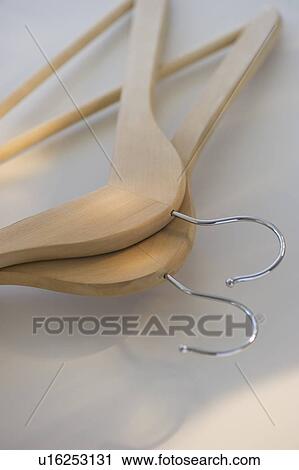 Stock Image - Wooden hangers. Fotosearch