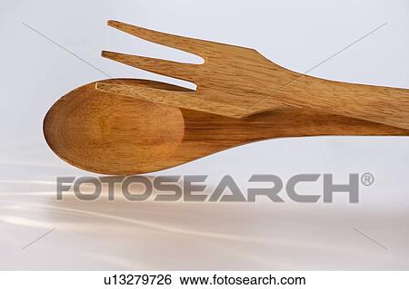 Stock Photograph - Wooden salad fork and spoon. Fotosearch