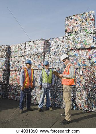 Workers at recycling plant View Large Photo Image Stock Image - Workers at recycling plant. Fotosearch