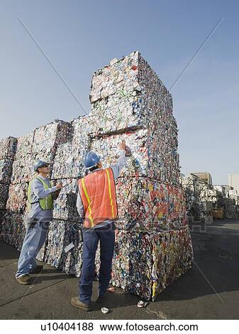Workers at recycling plant View Large Photo Image Stock Photo - Workers at recycling plant. Fotosearch