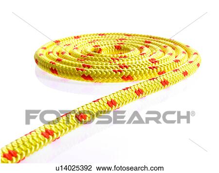 Yellow rope in a circular pattern View Large Photo Image Stock Image - Yellow rope in a circular pattern. Fotosearch