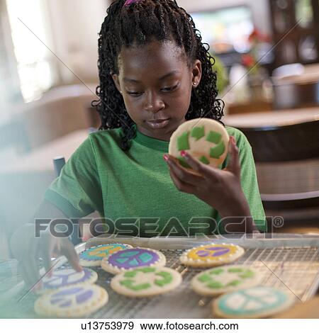 Young girl baking cookies View Large Photo Image Stock Photo - Young girl baking cookies. Fotosearch