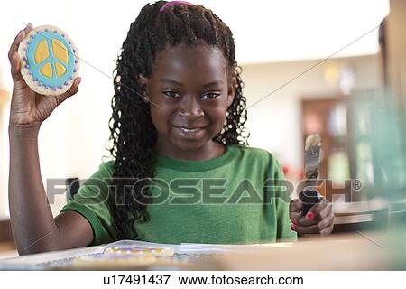 Young girl baking cookies View Large Photo Image Stock Photo - Young girl baking cookies. Fotosearch