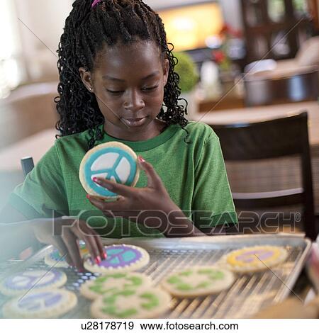 Young girl baking cookies View Large Photo Image Stock Photo - Young girl baking cookies. Fotosearch