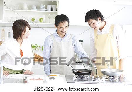 A family making hamburger stake View Large Photo Image Stock Photo - A family making hamburger stake. Fotosearch