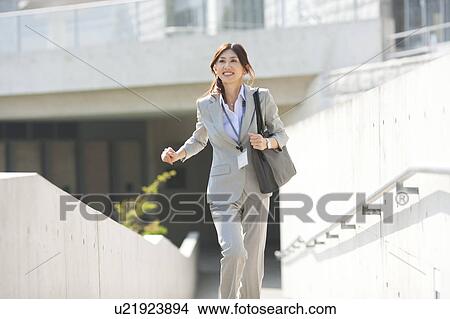 A running business woman View Large Photo Image Picture - A running business woman. Fotosearch