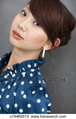 A young woman's portrait View Large Photo Image Stock Image - A young woman's portrait. Fotosearch