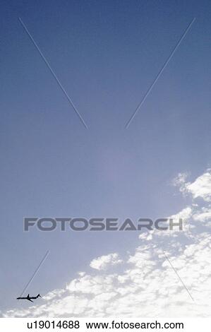 Stock Photo - Airplane in Sky. Fotosearch