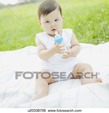 Baby Girl With Bottle View Large Photo Image Stock Photograph - Baby Girl With Bottle. Fotosearch