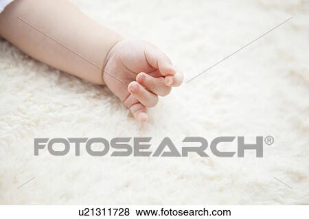 Stock Photo - Baby's Hand. Fotosearch