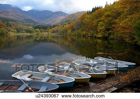 Stock Photo - Boats in Lake Daigenta-Ko. Fotosearch