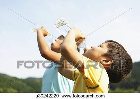 Boy and Girl Drinking Water View Large Photo Image Stock Image - Boy and Girl Drinking Water. Fotosearch