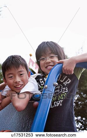 Boys on jungle gym, Japan View Large Photo Image Stock Image - Boys on jungle gym, Japan. Fotosearch