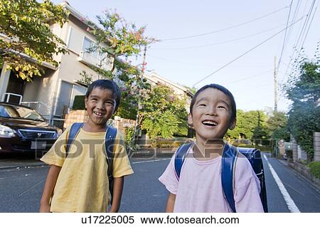Stock Photography - Boys smiling, Tokyo Prefecture, Honshu, Japan. Fotosearch