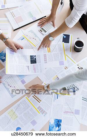 Business people having a meeting View Large Photo Image Stock Photo - Business people having a meeting. Fotosearch