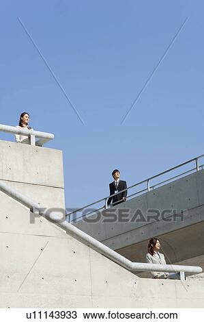 Business people looking into far distance View Large Photo Image Stock Image - Business people looking into far distance. Fotosearch
