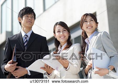 Business people looking into far distance View Large Photo Image Stock Image - Business people looking into far distance. Fotosearch