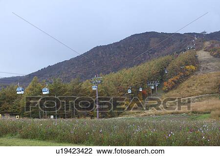 Stock Image - Cable Car at Adatara Mountain. Fotosearch