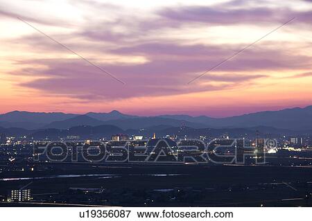 Stock Photo - Cityscape of Fukui at dusk, Fukui Prefecture, Honshu, Japan. Fotosearch