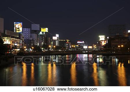 Stock Photo - Cityscape of Fukuoka city at night, Fukuoka Prefecture, Kyushu, Japan. Fotosearch