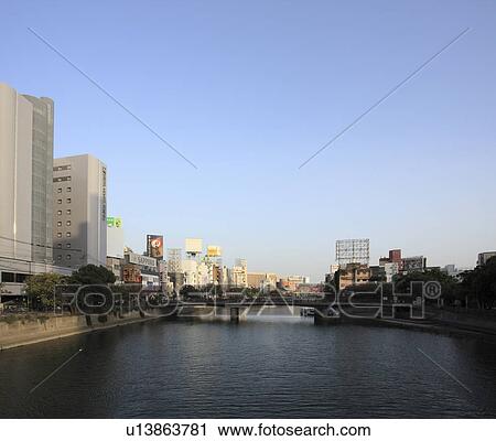 Stock Image - Cityscape of Fukuoka city from Nishi Ohashi bridge, Fukuoka Prefecture, Kyushu, Japan. Fotosearch