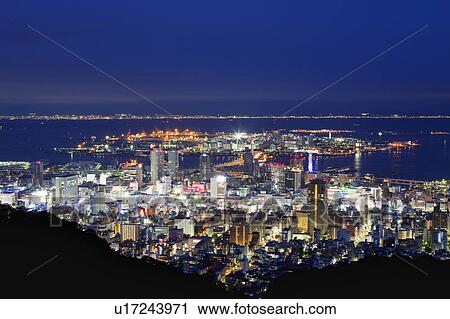 Stock Image - Cityscape of Kobe city from Mt. Shisho at night, Hyogo Prefecture, Honshu, Japan. Fotosearch