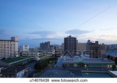 Stock Photo - Cityscape of Naha city at dawn, Okinawa Prefecture, Japan. Fotosearch