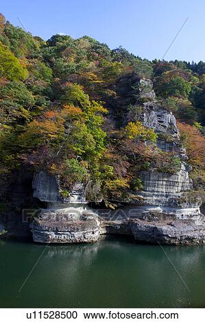 Stock Image - Cliffs by Sea in Autumn. Fotosearch