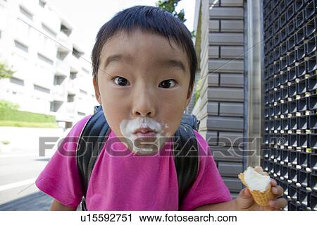 Close-up of a boy making a face, Japan View Large Photo Image Stock Image - Close-up of a boy making a face, Japan. Fotosearch