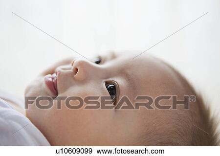 Close up of Baby Boy Looking up View Large Photo Image Stock Photo - Close up of Baby Boy Looking up. Fotosearch