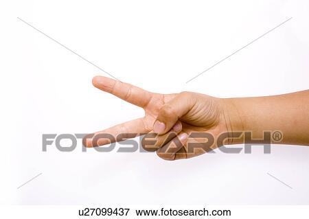 Stock Photo - Close-up of child's hand playing Rock Paper Scissors. Fotosearch