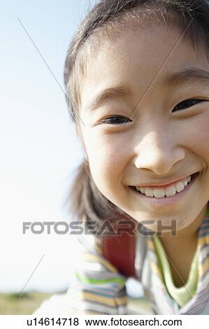 Stock Photo - Close up Portrait of Young Girl. Fotosearch