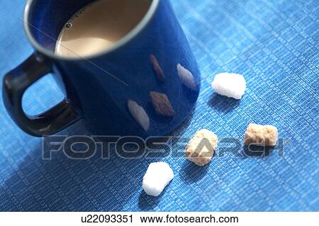 Stock Image - Coffee and sugar cubes. Fotosearch