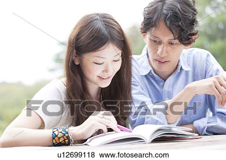 College students studying together View Large Photo Image Stock Photo - College students studying together. Fotosearch