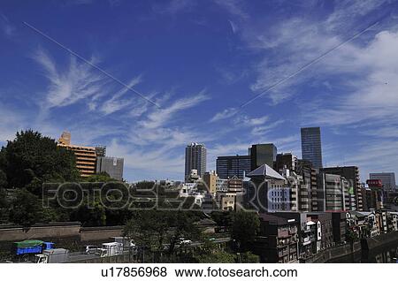 Stock Photo - Crowded Buildings Under Blue Sky. Fotosearch