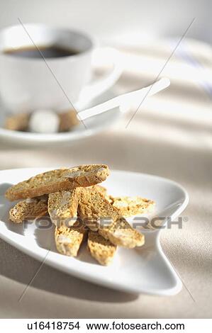 Picture - Cup of coffee and biscotti. Fotosearch