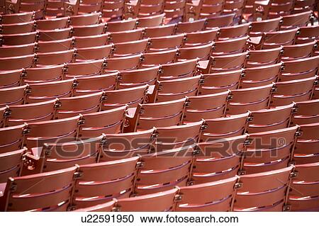Stock Image - Empty stadium seats. Fotosearch