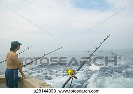 Fisherman on boat, Tokyo prefecture, Japan View Large Photo Image Stock Image - Fisherman on boat, Tokyo prefecture, Japan. Fotosearch