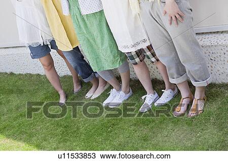 Five Young Woman Standing on Lawn View Large Photo Image Stock Image - Five Young Woman Standing on Lawn. Fotosearch